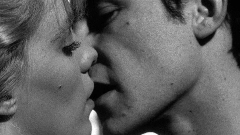 A couple about to kiss in Who's That Knocking at My Door