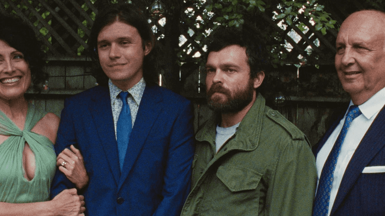 A family of four posing outside in 'Shadow Brother Sunday'