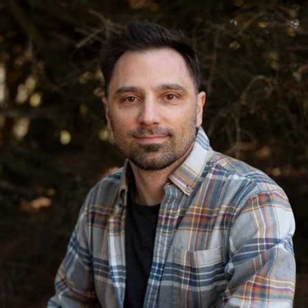 A headshot of film editor Darren Lund