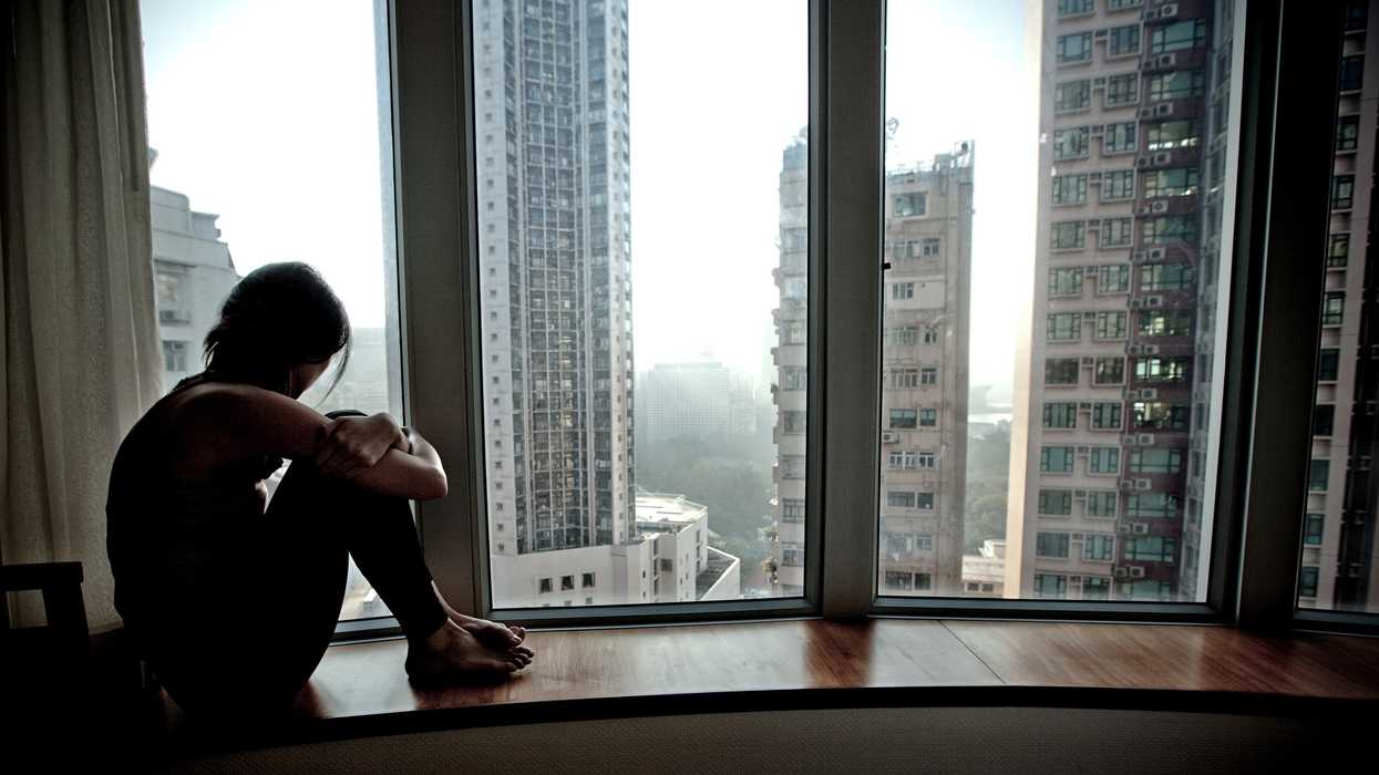 A-lonely-girl-looking-out-014_0