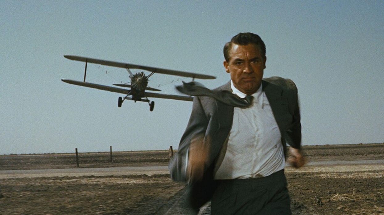 A man gets chased by a plane.