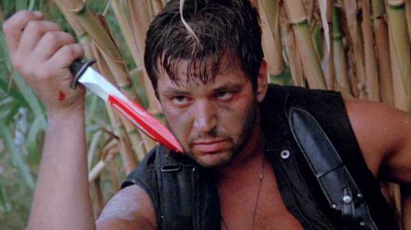 A man holding a bloody knife in Killzone