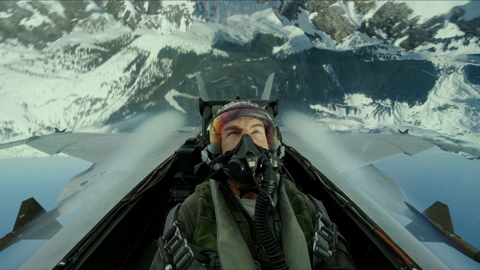 A man in a fighter jet above snow covered mountains, 'Top Gun: Maverick'