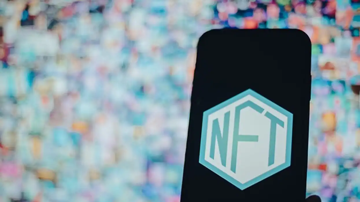 A phone screen displaying an NFT, 'Life Log Box'