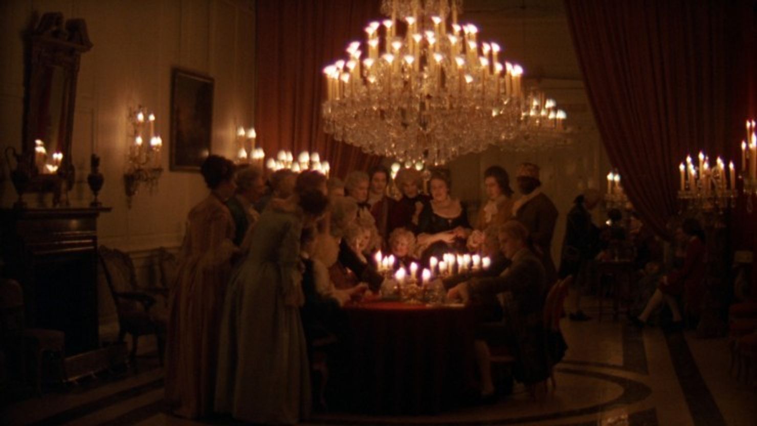 A room full of people surrounded by candle light, 'Barry Lyndon'