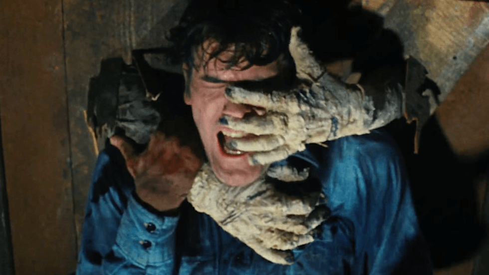 A scene featuring Bruce Campbell as Ash Williams fromThe Evil Dead (1981)