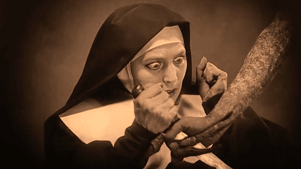 A scene from the silent documentary-style film H\u00e4xan (1922)
