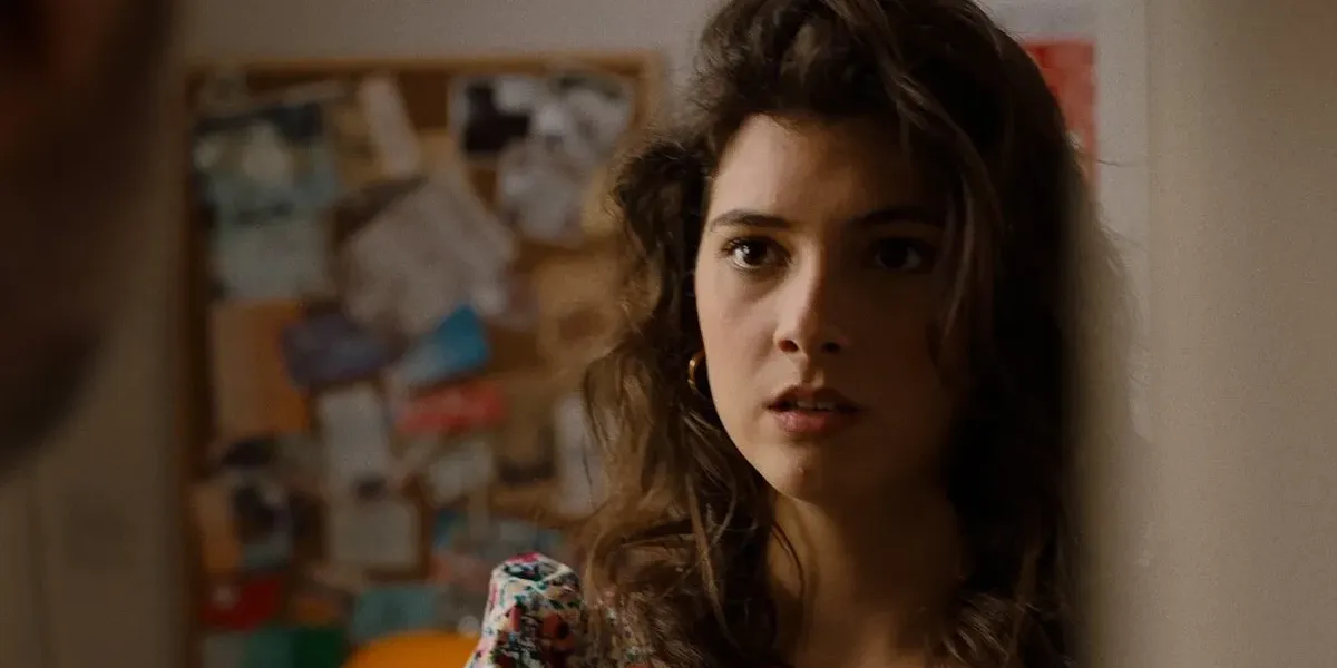 A woman looking in a mirror in 'Your Guardian'