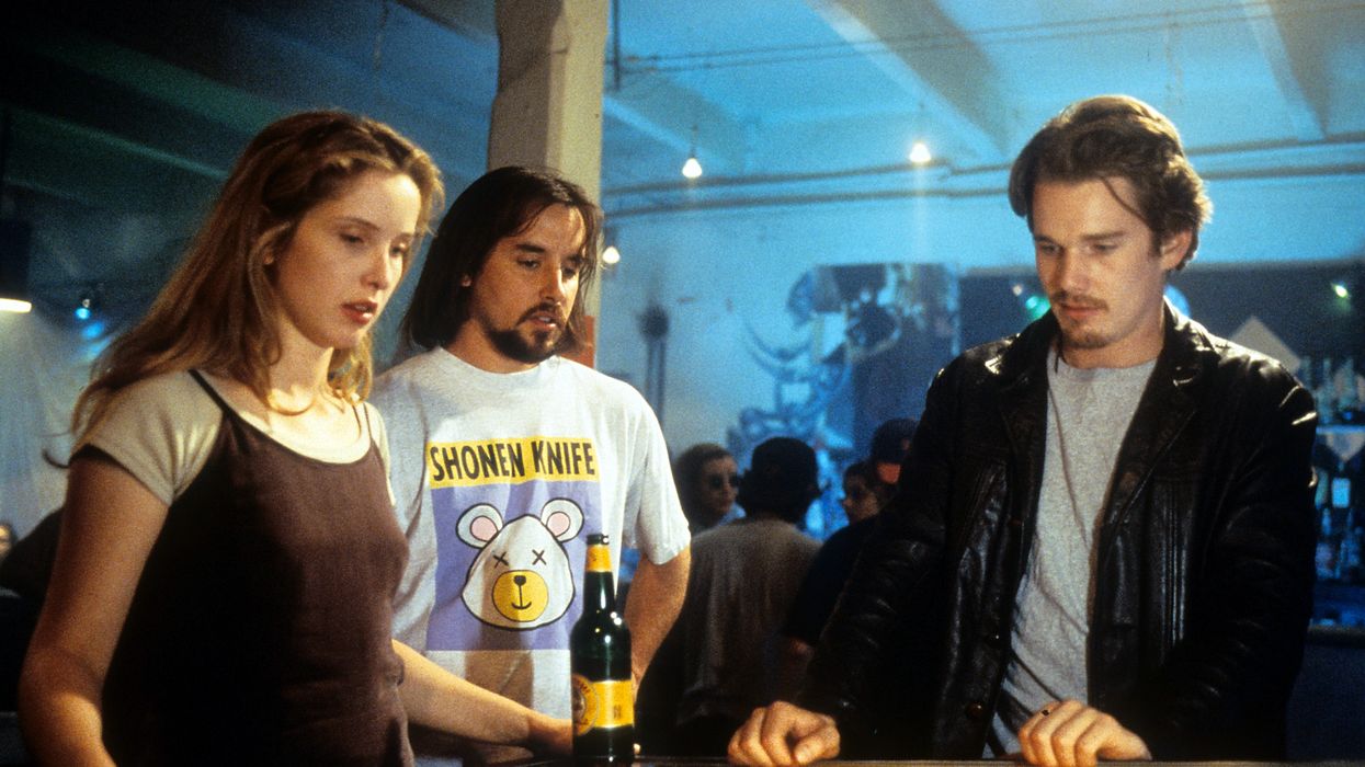 A woman playing pinball at a bar in 'Before Sunrise'