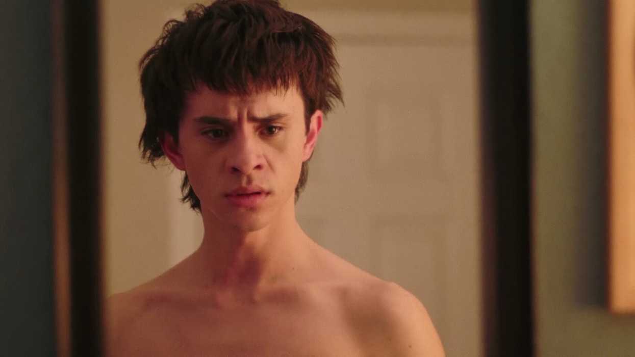 A young man looking at himself in the mirror in TITTY BOY