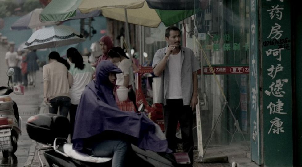 Actor Chen Gang in a scene from Johnny Ma's Old Stone.