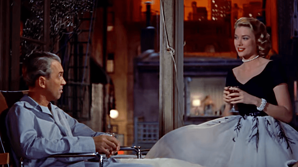 Actors James Stewart and Grace Kelly in a scene from \u2018Rear Window\u2019 (1954)