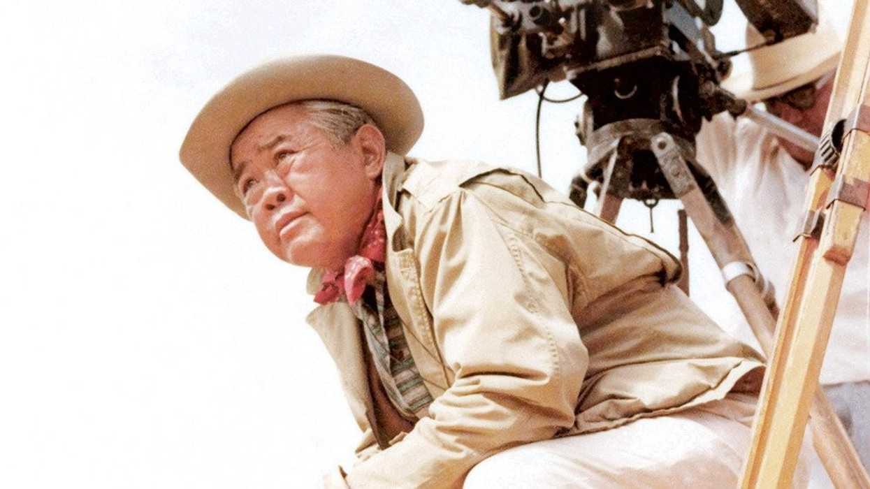 An image of James Wong Howe on set of an unknown film.