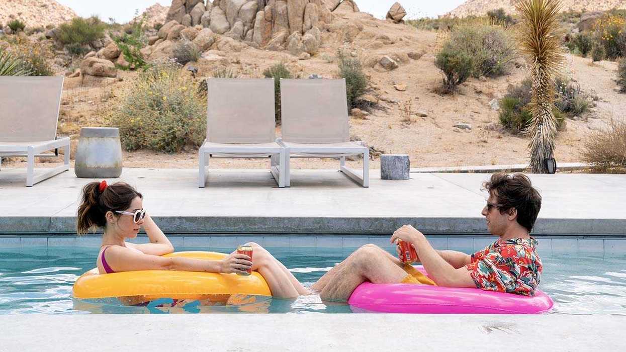 Andy Samberg as Nyles and Christin Milioti as Sarah Wilder