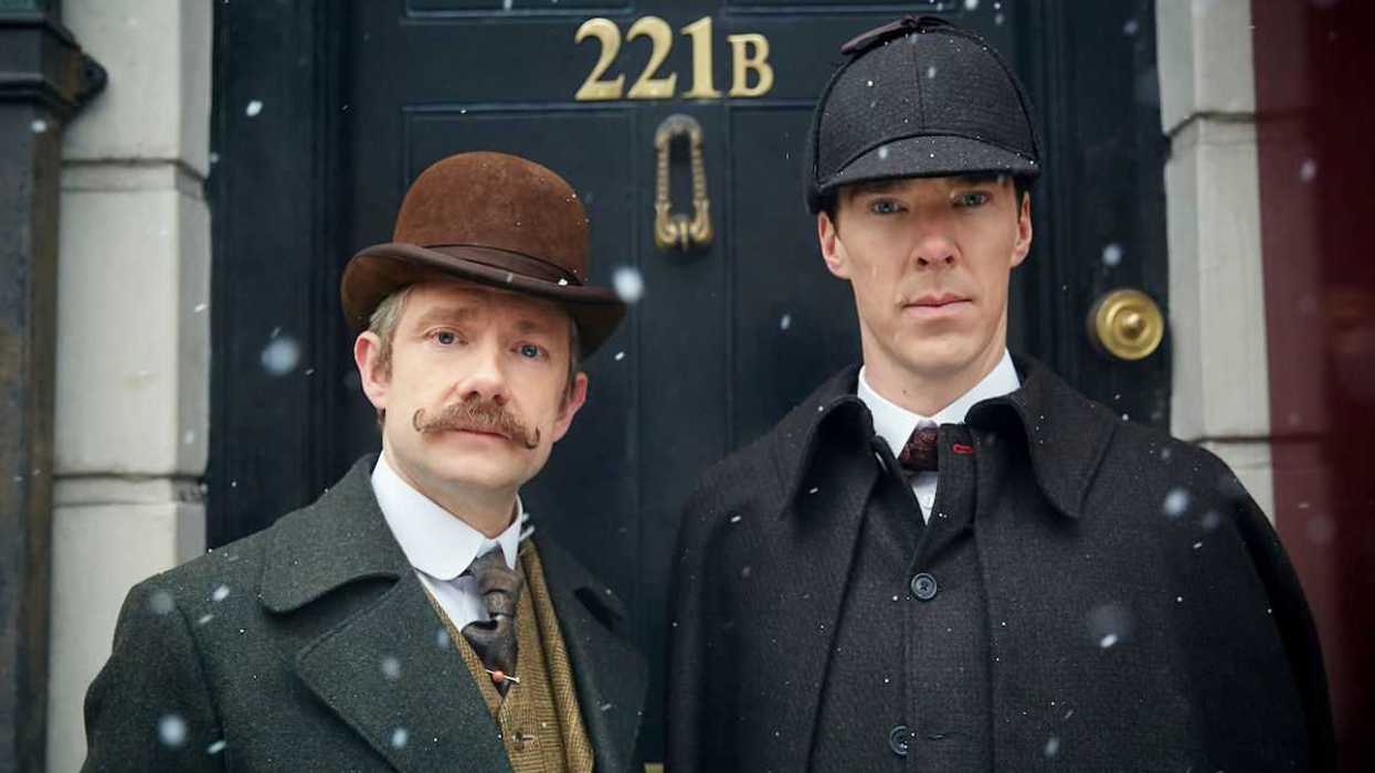 Benedict Cumberbatch and Martin Freeman as Sherlock Holmes and Dr. Watson