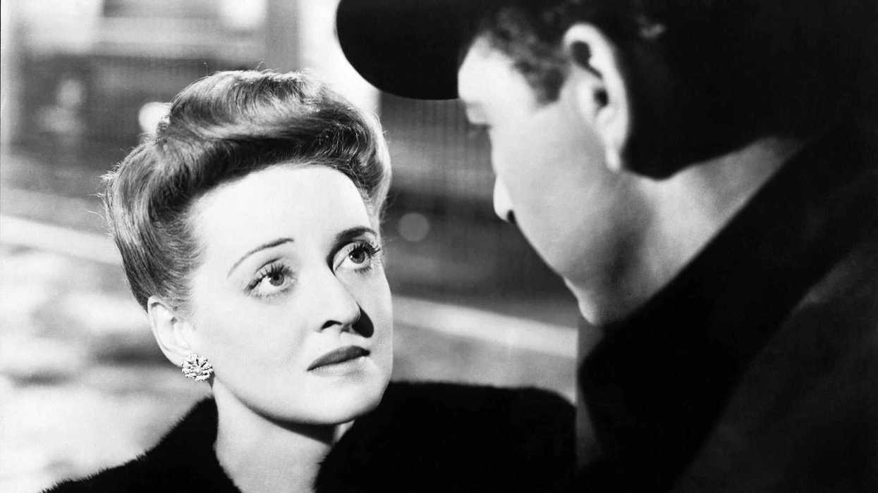 Bette Davis and Paul Henreid in a still from Now, Voyager (1942)