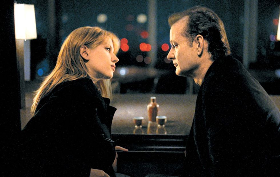 Bob Harris, played by Bill Murray, staring at Charlotte, played by Scarlett Johansson, in 'Lost in Translation'