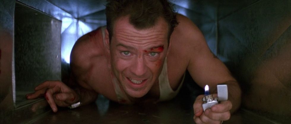 Bruce Willis as John McClane