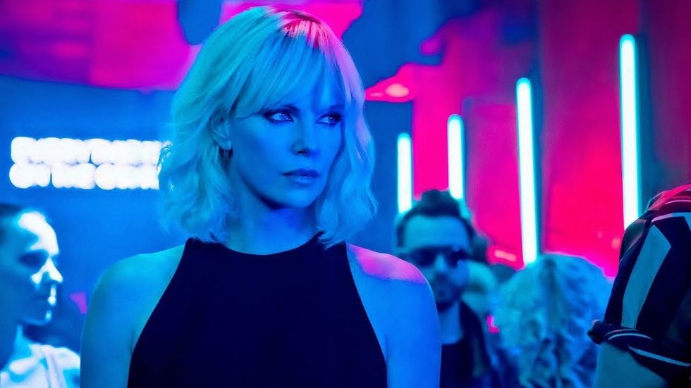 Charlize Theron as Lorraine Broughton in a club in 'Atomic Blonde'
