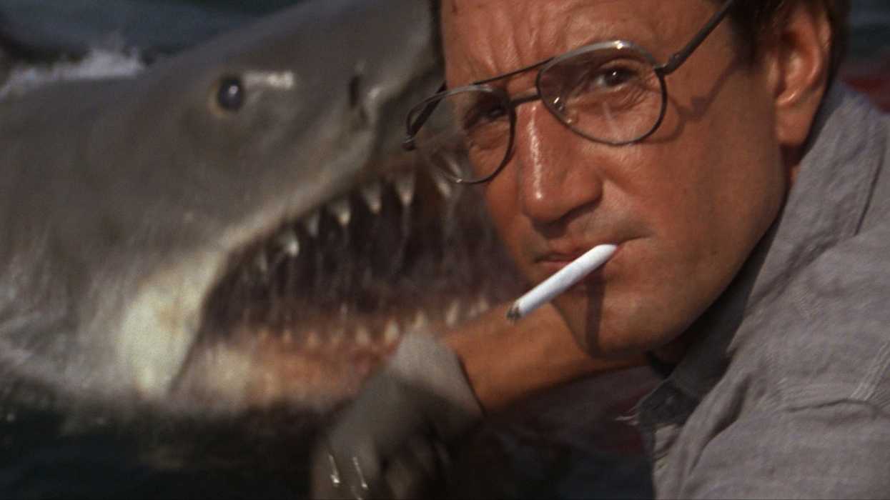 Cheif Brody, played by Roy Scheider, dumping chum as the shark appears in 'Jaws'