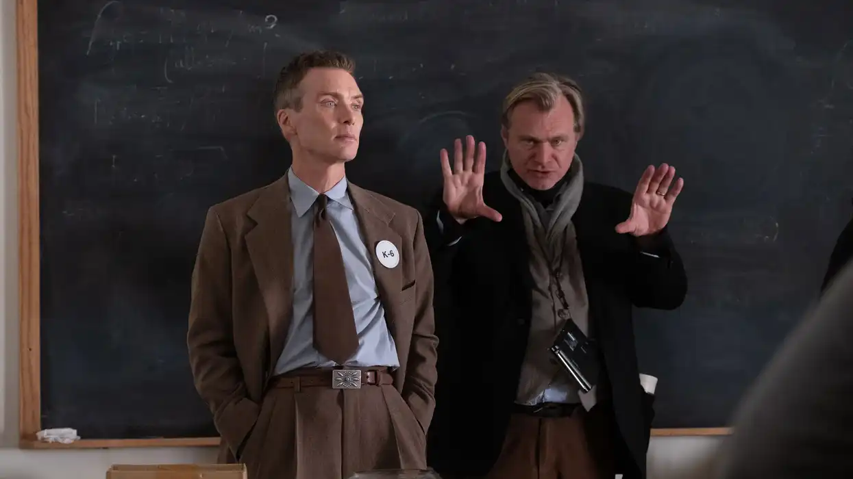 Cillian Murphy as J. Robert Oppenheimer on set with Christopher Nolan on 'Oppenheimer'