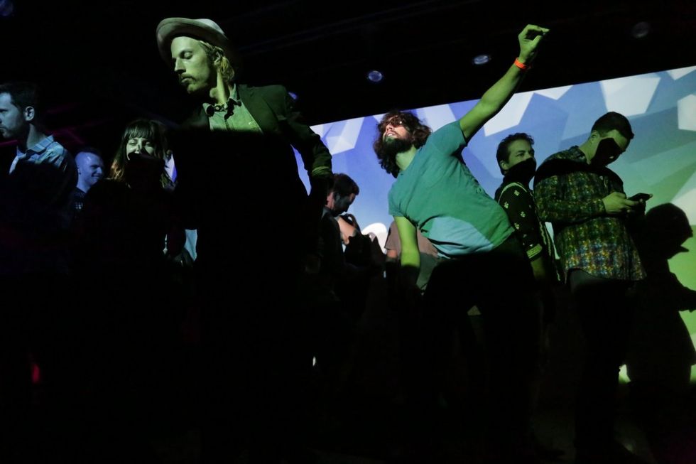 Dancing_on_stage_at_vimeo_party_oakleyandersonmoore