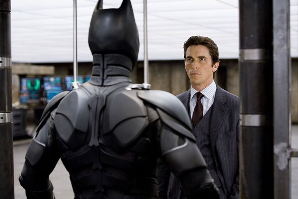 Dark_knight_bruce_looking_at_suit
