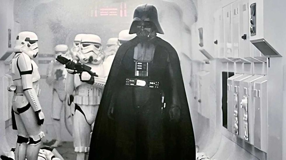 Darth Vader standing with Stormtroopers in Star Wars 1977