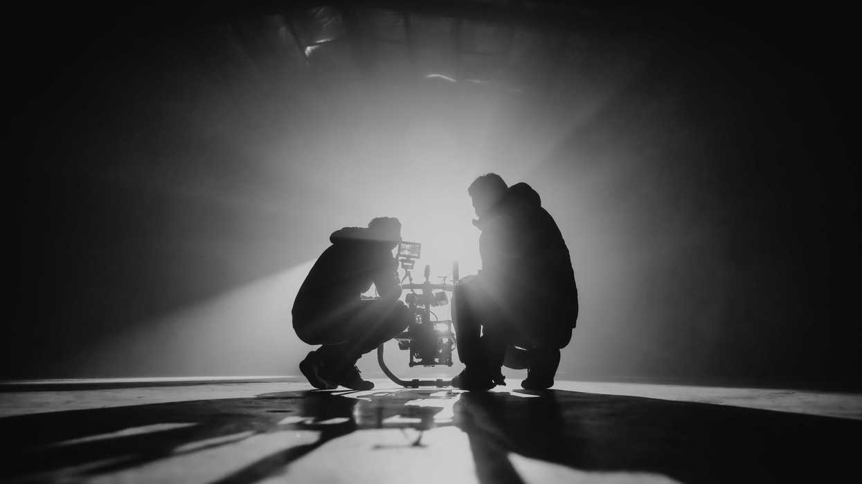 Director and Producer line up camera shot before action is called