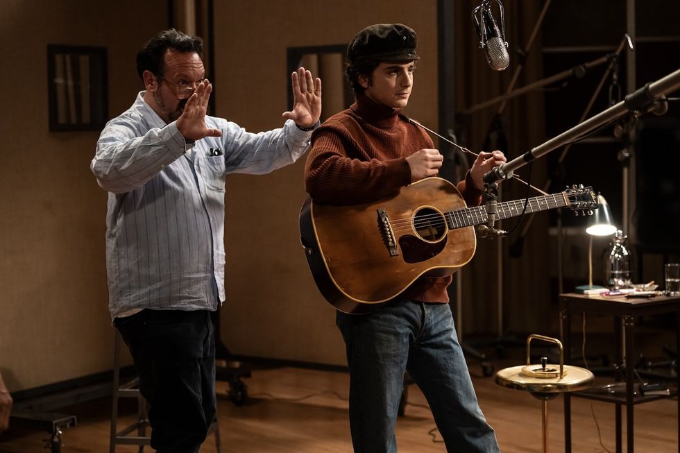 Director James Mangold and Timothe\u0301e Chalamet on the set of A Complete Unknown. Photo by Macall Polay, Courtesy of Searchlight Pictures. \u00a9 2024 Searchlight Pictures All Rights Reserved.