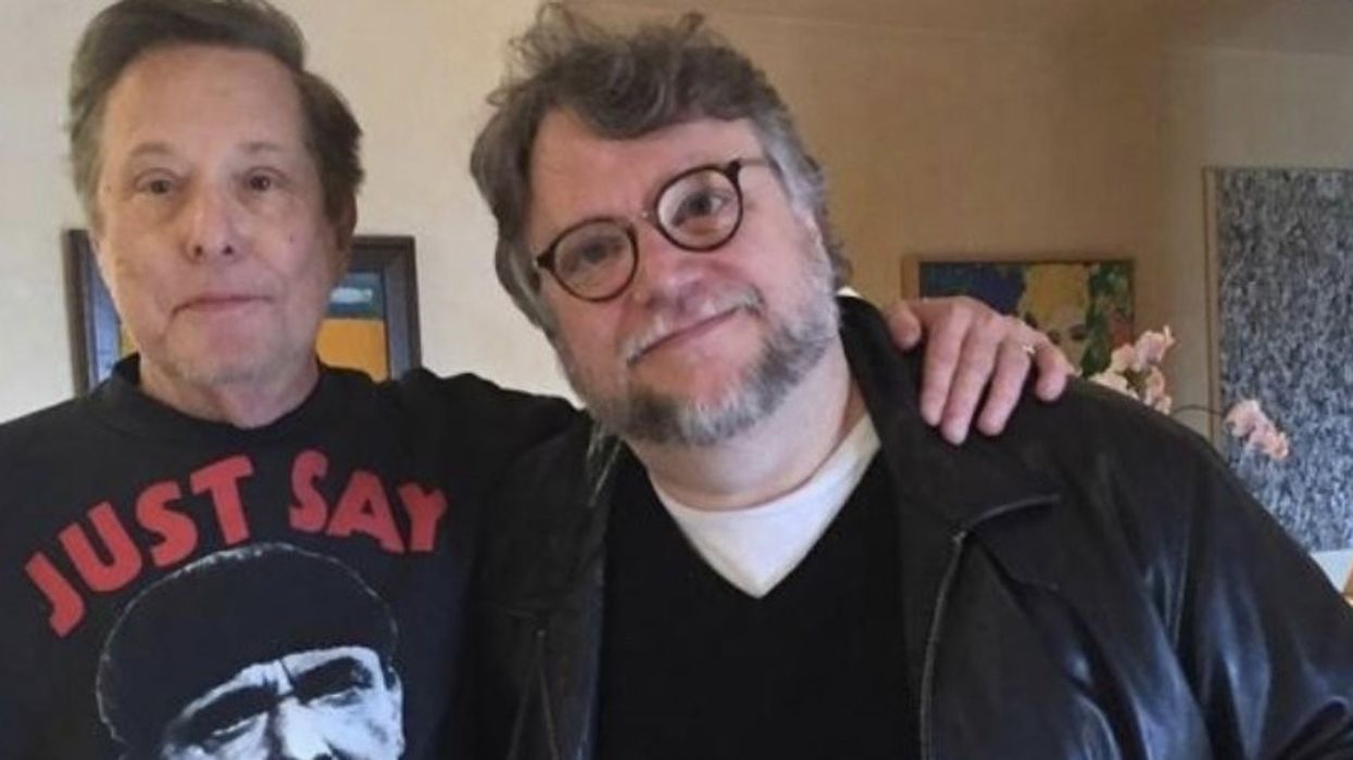 FIlmmakers William Friedkin and Guillermo del Toro posing together.