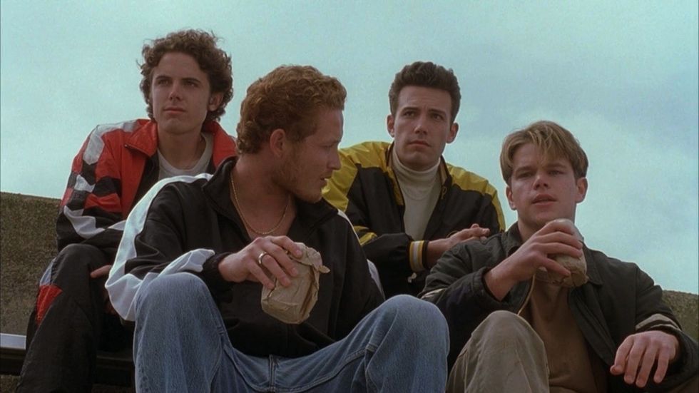 Four men drinking beers on bleachers in 'Good Will Hunting'