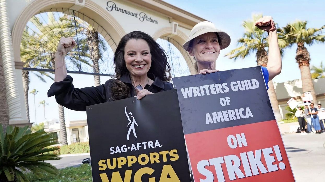 Fran Drescher, left, president of SAG-AFTRA, and Meredith Stiehm, president of Writers Guild of America West, during a rally by striking writers on May 8, 2023