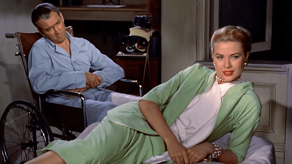 Grace Kelly wearing a classic mint green two-piece skirt suit in \u2018Rear Window\u2019 (1954)