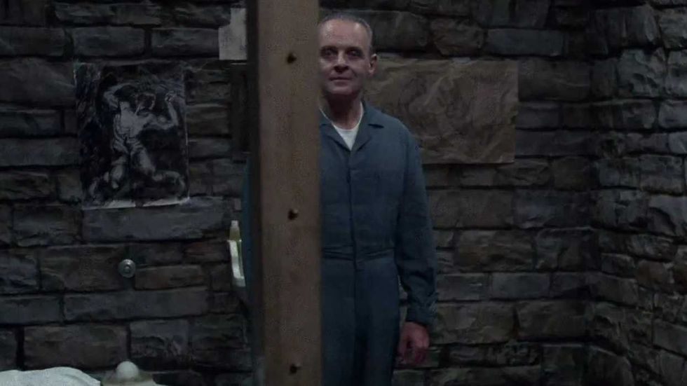 Hannibal Lecter viewed behind a post in his cell in The Silence of the Lambs