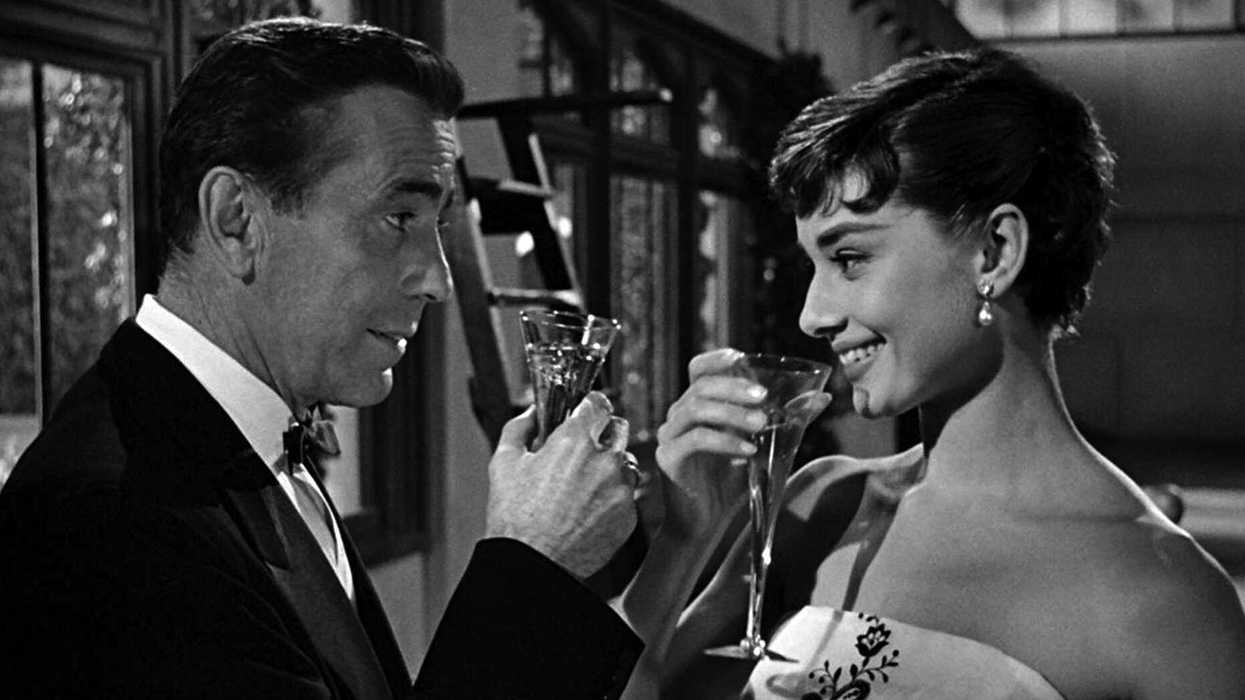 Humphrey Bogart and Audrey Hepburn in a still from Sabrina (1954)