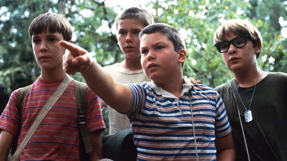 Jerry O"Connell as Vern points while his friends look on in Stand by Me