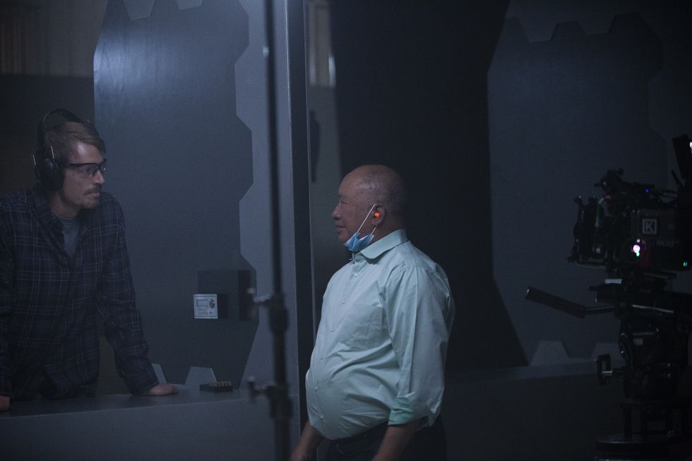 Joel Kinnaman and John Woo behind the scenes of Silent Night