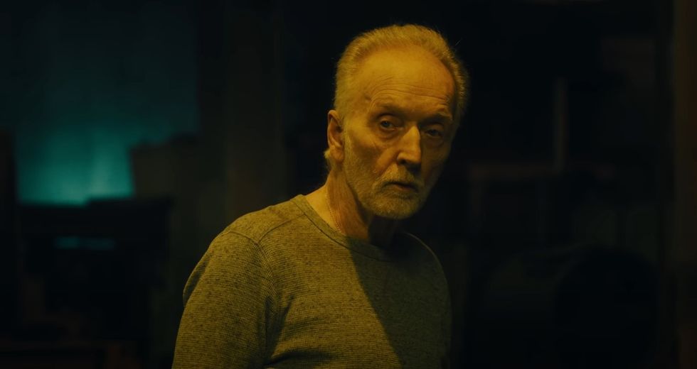 John Kramer, played by Tobin Bell, explaining a trap in 'Saw X'