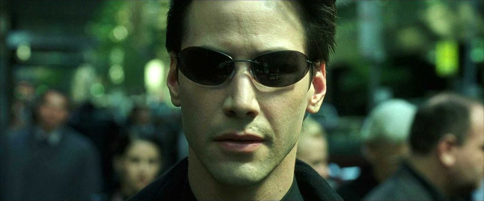 Keanu Reeves as the character Neo in the 1999 sci-fi film The Matrix