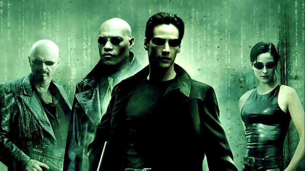 Keanu Reeves, Carrie Anne-Moss, Laurence Fishburne, and Joe Pantoliano in \u2018The Matrix\u2019
