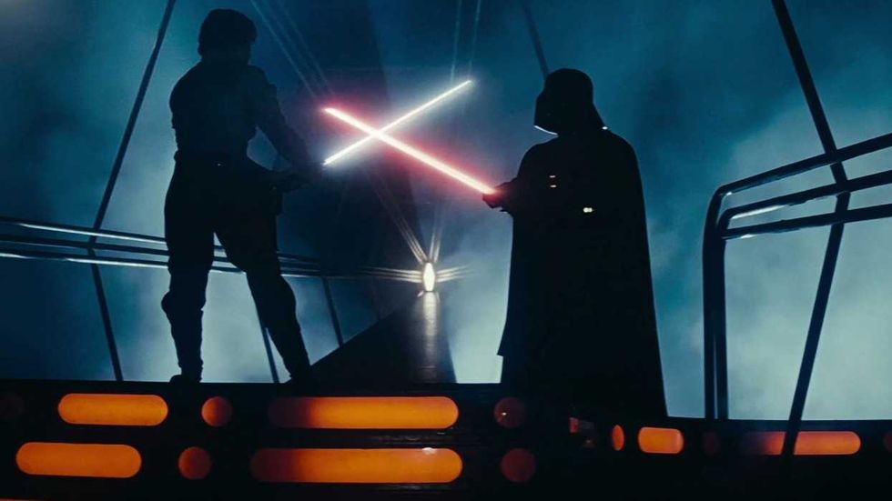 Luke and Darth Vader dueling with light sabers in The Empire Strikes Back