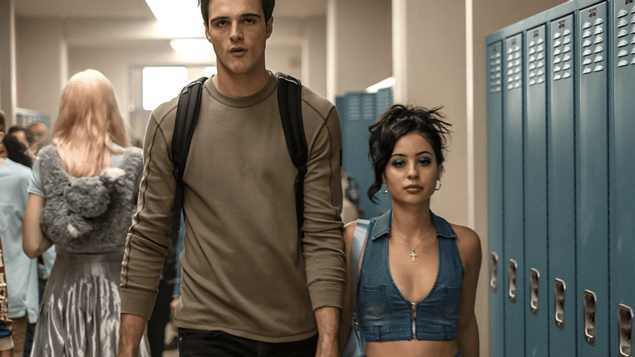 Maddy, played by Alexa Demie, and Nate, played by Jacob Elordi, walking down a high school hallway in 'Euphoria'