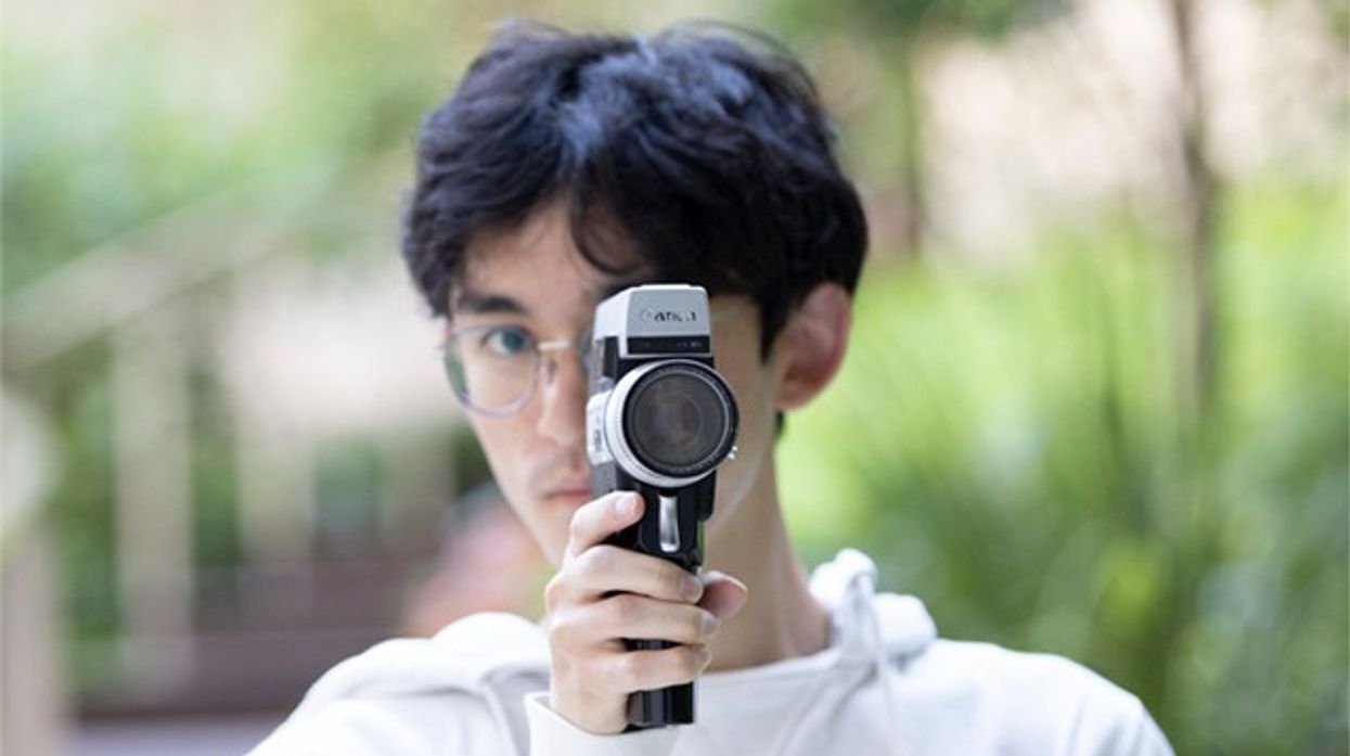Man holding a video camera