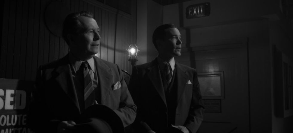 MANK (2020) Gary Oldman as Herman Mankiewicz and Tom Pelphrey as Joe Mankiewicz