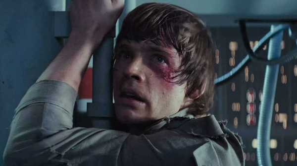 Mark Hamill as Luke Skywalker clinging to a girder in The Empire Strikes Back