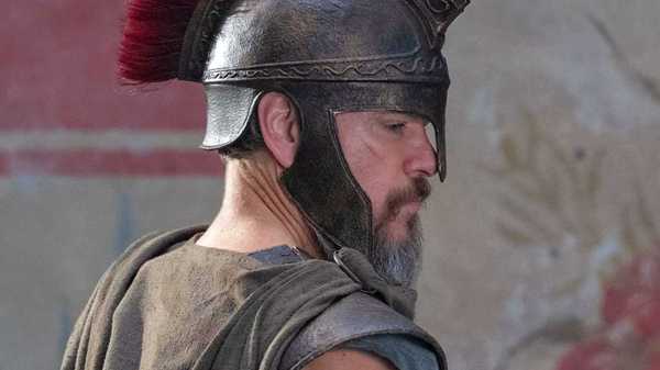 Matt Damon viewed in profile wearing a helmet in The Odyssey 2026