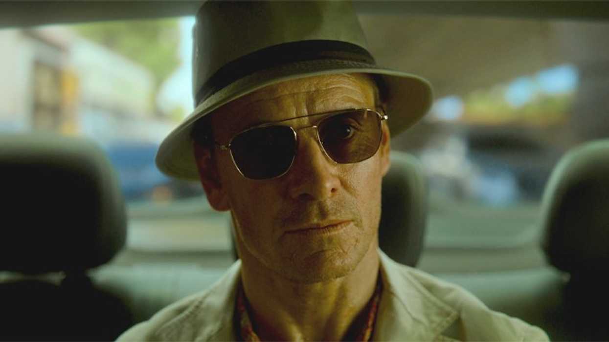 Michael Fassbender as The Killer in the back of a car in 'The Killer'