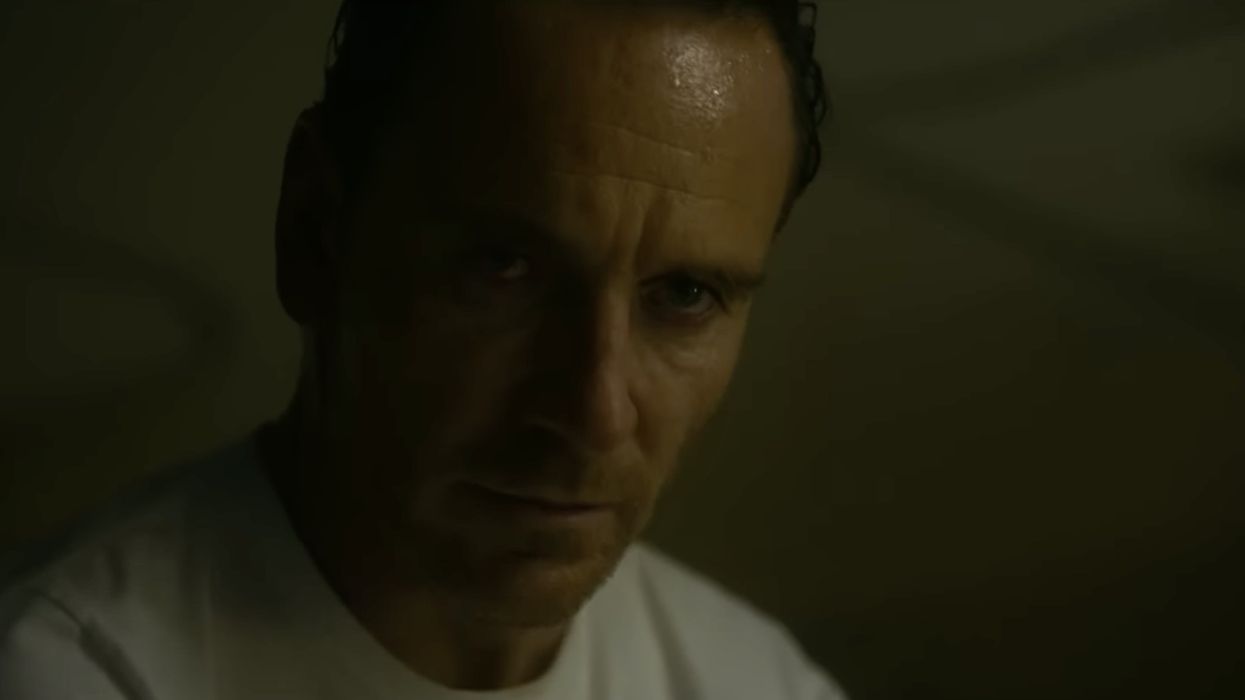 Michael Fassbender looking serious The Killer