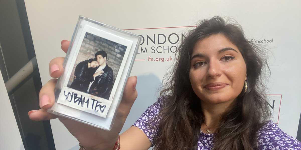 Mirjana Mimi Vlaovic holding a polaroid of her parents.